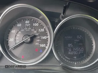 2014 Mazda CX-5 Grand Touring with VIN JM3KE2DY0E0354220, listed as a IAAI auction lot 41885502 with 168,901 mi miles. Bid and sale history available at carsss.com. Image 7.