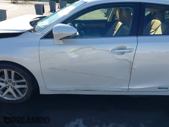 2014 Lexus CT 200h with VIN JTHKD5BH5E2203604, listed as a IAAI auction lot 41372030 with 147,449 mi miles and . Bid and sale history available at DreamBid. Image 17.