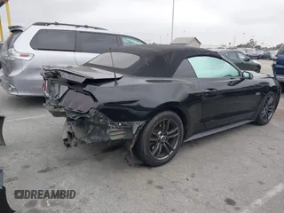 2015 Ford Mustang GT Premium z VIN 1FATP8FF8F5327105, wystawiony jako IAAI lot #42193645 z przebiegiem 105 347 mil mil oraz . Historia ofert i sprzedaży dostępna na DreamBid. Obrazek 4.