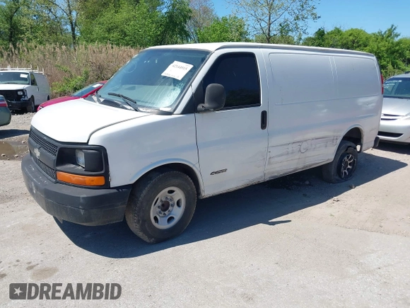 2004 Chevrolet Express Cargo Van with VIN 1GCGG25V441118708, listed as a IAAI auction lot 42144915 with 327,928 mi miles. Bid and sale history available at carsss.com. Image 2.