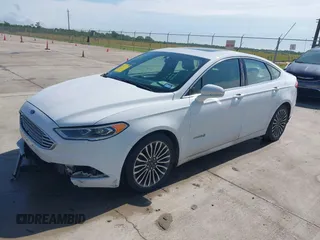 2018 Ford Fusion Titanium with VIN 3FA6P0RU3JR124007, listed as a IAAI auction lot 42207863 with 179,708 mi miles and . Bid and sale history available at DreamBid. Image 2.
