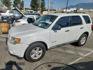 2009 Ford Escape Hybrid with VIN 1FMCU49389KA28941, listed as a Copart auction lot 65375415 with 27,428 mi miles and Clean title. Bid and sale history available at DreamBid. Image 1.