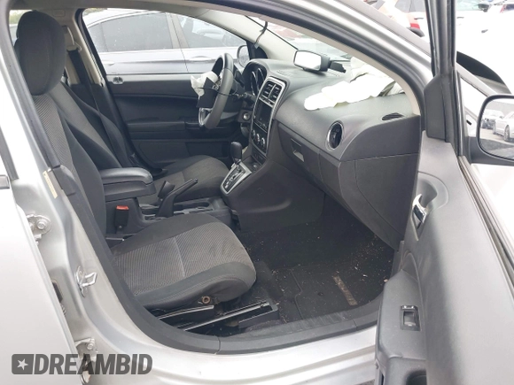 2011 Dodge Caliber Mainstreet with VIN 1B3CB3HA7BD257420, listed as a IAAI auction lot 42068329 with Not Provided miles. Bid and sale history available at carsss.com. Image 5.