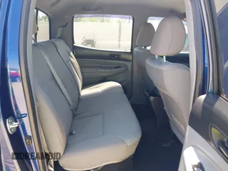 2014 Toyota Tacoma PreRunner with VIN 3TMJU4GN8EM157541, listed as a IAAI auction lot 41998374 with 113,830 mi miles. Bid and sale history available at carsss.com. Image 8.