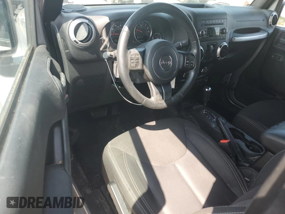 2015 Jeep Wrangler Sahara with VIN 1C4AJWBG1FL705900, listed as a Copart auction lot 62353275 with 64,866 mi miles and Salvage title. Bid and sale history available at DreamBid. Image 8.