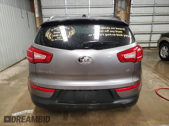 2012 Kia Sportage EX with VIN KNDPCCA28C7246734, listed as a Copart auction lot 57668255 with 128,258 mi miles and Clean title. Bid and sale history available at DreamBid. Image 6.