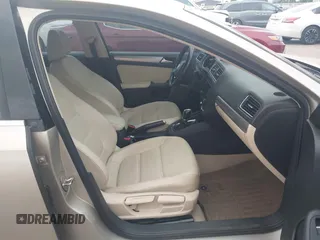 2015 Volkswagen Jetta Sedan 1.8T SE w/Connectivity with VIN 3VWD07AJ0FM231873, listed as a IAAI auction lot 42142327 with 156,230 mi miles. Bid and sale history available at carsss.com. Image 5.
