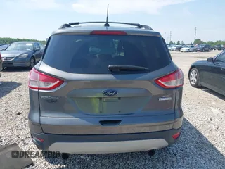 2013 Ford Escape SE with VIN 1FMCU0GX6DUB29519, listed as a IAAI auction lot 42281464 with 129,671 mi miles and . Bid and sale history available at DreamBid. Image 16.