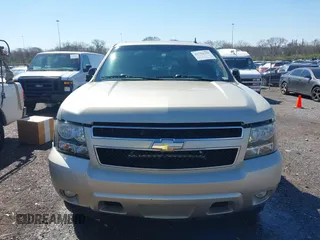 2014 Chevrolet Suburban LT with VIN 1GNSCJE07ER120130, listed as a IAAI auction lot 41792310 with 238,313 mi miles. Bid and sale history available at carsss.com. Image 12.
