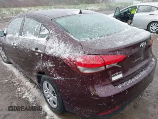2017 Kia Forte LX with VIN 3KPFK4A7XHE071992, listed as a IAAI auction lot 42039101 with 76,682 mi miles. Bid and sale history available at carsss.com. Image 3.