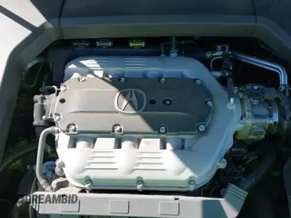 2014 Acura TL Technology z VIN 19UUA8F58EA004641, wystawiony jako IAAI lot #42061148 z przebiegiem 71 003 mil mil oraz . Historia ofert i sprzedaży dostępna na DreamBid. Obrazek 21.