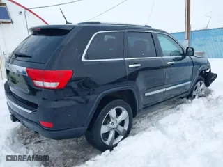 2011 Jeep Grand Cherokee Overland with VIN 1J4RR6GT5BC604784, listed as a IAAI auction lot 41515626 with 66,654 mi miles. Bid and sale history available at carsss.com. Image 4.