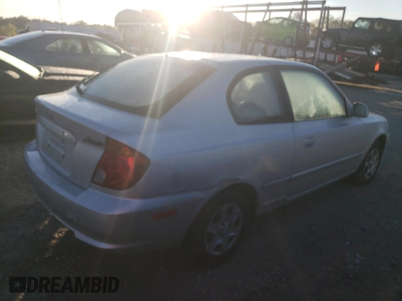 2004 Hyundai Accent GL with VIN KMHCG35C44U284868, listed as a Copart auction lot 74054884 with 87,259 mi miles and Clean Title. Bid and sale history available at carsss.com. Image 3.