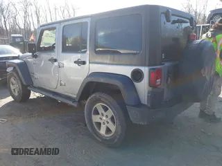 2015 Jeep Wrangler Unlimited Sport with VIN 1C4BJWDG4FL732123, listed as a IAAI auction lot 41864714 with 142,382 mi miles. Bid and sale history available at carsss.com. Image 3.