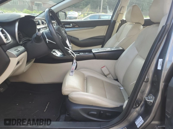 2016 Nissan Maxima SL with VIN 1N4AA6APXGC903559, listed as a Copart auction lot 61213525 with 124,575 mi miles and Salvage title. Bid and sale history available at DreamBid. Image 7.