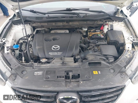 2016 Mazda CX-5 Grand Touring z VIN JM3KE2DY8G0885006, wystawiony jako IAAI lot #41615873 z przebiegiem 118 890 mil mil oraz . Historia ofert i sprzedaży dostępna na DreamBid. Obrazek 10.