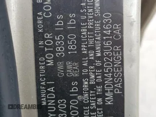 2003 Hyundai Elantra GLS z VIN KMHDN45D23U614630, wystawiony jako Copart lot #85921924 z przebiegiem 182 122 mil mil oraz Szkoda całkowita • Salvage title. Historia ofert i sprzedaży dostępna na DreamBid. Obrazek 13.