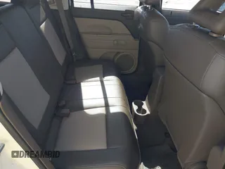 2007 Jeep Patriot Sport with VIN 1J8FT28W07D363173, listed as a IAAI auction lot 41791711 with 117,446 mi miles and . Bid and sale history available at DreamBid. Image 8.