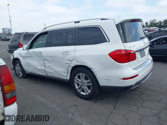 2014 Mercedes-Benz GL 450 z VIN 4JGDF7CE0EA424081, wystawiony jako IAAI lot #42359465 z przebiegiem 145 363 mil mil oraz . Historia ofert i sprzedaży dostępna na DreamBid. Obrazek 14.