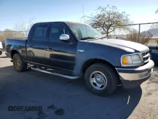 2002 Ford F-150 XLT with VIN 1FTRW07682KB94008, listed as a Copart auction lot 88724185 with 231,464 mi miles and Salvage Title. Bid and sale history available at carsss.com. Image 4.