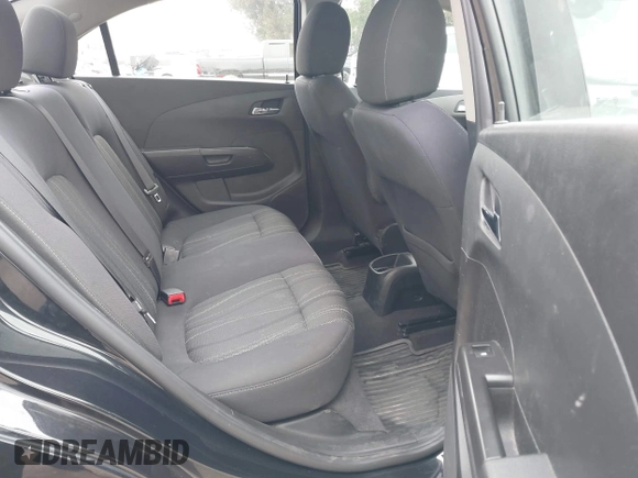 2014 Chevrolet Sonic LT z VIN 1G1JC5SB4E4153240, wystawiony jako IAAI lot #42383467 z przebiegiem 146 218 mil mil oraz . Historia ofert i sprzedaży dostępna na DreamBid. Obrazek 8.