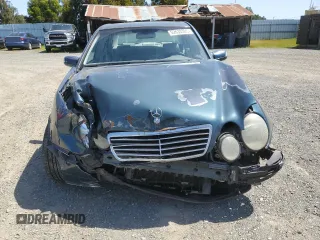 2000 Mercedes-Benz E-Class with VIN WDBJF65J1YB151080, listed as a Copart auction lot 54421955 with 392,612 mi miles and Salvage Title. Bid and sale history available at carsss.com. Image 5.