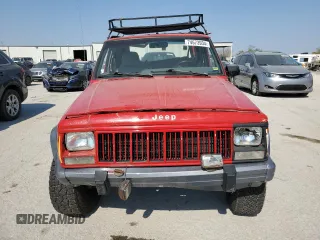 1996 Jeep Cherokee Country with VIN 1J4FJ78S9TL130605, listed as a Copart auction lot 74673934 with 196,857 mi miles and Salvage Title. Bid and sale history available at carsss.com. Image 5.