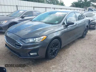 2019 Ford Fusion SE with VIN 3FA6P0HD7KR169700, listed as a IAAI auction lot 42064494 with 56,463 mi miles and . Bid and sale history available at DreamBid. Image 17.