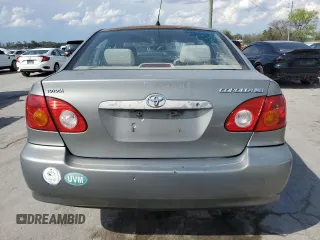2004 Toyota Corolla CE with VIN 1NXBR32E74Z240293, listed as a Copart auction lot 52624445 with 299,999 mi miles and Salvage Title. Bid and sale history available at DreamBid. Image 6.