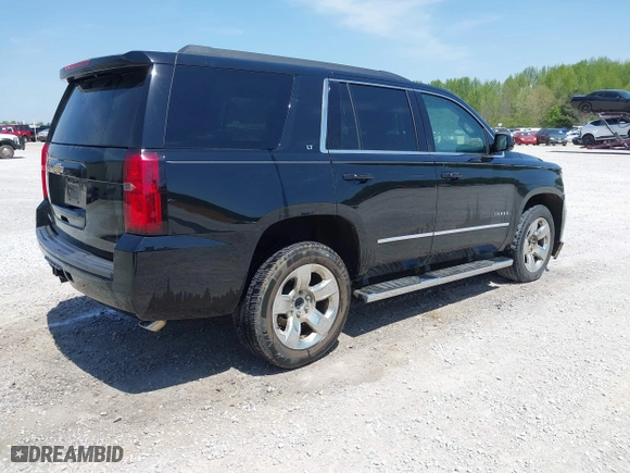 2019 Chevrolet Tahoe LT with VIN 1GNSCBKC4KR231153, listed as a IAAI auction lot 42017325 with 116,960 mi miles. Bid and sale history available at carsss.com. Image 4.