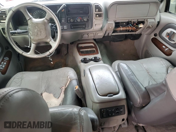 2000 GMC Denali z VIN 1GKEK13RXYR110436, wystawiony jako Copart lot #74311244 z przebiegiem 250 735 mil mil oraz Szkody całkowita. Historia ofert i sprzedaży dostępna na DreamBid. Obrazek 8.