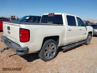 2014 Chevrolet Silverado 1500 LT with VIN 3GCPCREC4EG115927, listed as a IAAI auction lot 41862827 with 115,617 mi miles. Bid and sale history available at carsss.com. Image 4.