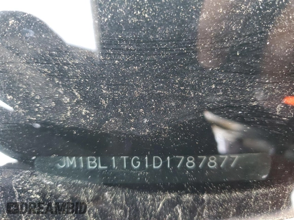 2013 Mazda 3 i SV with VIN JM1BL1TG1D1787877, listed as a Copart auction lot 53020215 with 169,176 mi miles and Salvage Title. Bid and sale history available at DreamBid. Image 12.