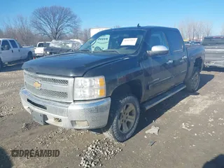 2012 Chevrolet Silverado 1500 LT with VIN 3GCPKSE73CG266901, listed as a IAAI auction lot 41427513 with 301,142 mi miles. Bid and sale history available at carsss.com. Image 2.