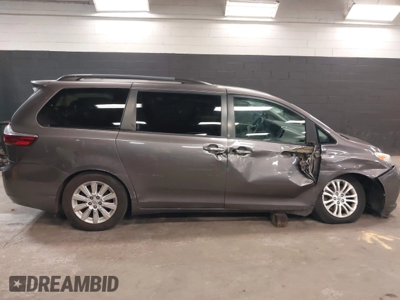 2015 Toyota Sienna XLE with VIN 5TDYK3DC3FS677780, listed as a IAAI auction lot 42155459 with 102,355 mi miles. Bid and sale history available at carsss.com. Image 13.