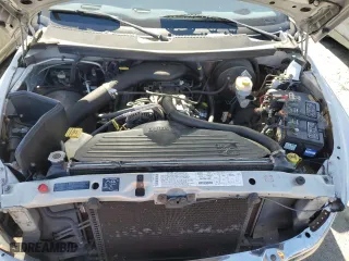 2000 Dodge Ram 1500 with VIN 3B7HC13Y4YG120005, listed as a Copart auction lot 57108154 with 124,940 mi miles and Salvage Title. Bid and sale history available at carsss.com. Image 11.