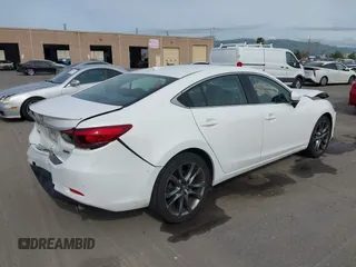 2016 Mazda Mazda6 i Grand Touring with VIN JM1GJ1W51G1444867, listed as a IAAI auction lot 41988597 with 86,844 mi miles. Bid and sale history available at carsss.com. Image 4.