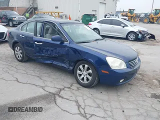 2006 Kia Optima LX z VIN KNAGE123465073250, wystawiony jako IAAI lot #42469136 z przebiegiem 126 445 mil mil oraz . Historia ofert i sprzedaży dostępna na DreamBid. Obrazek 1.