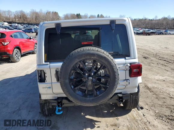 2024 Jeep Wrangler Sahara with VIN 1C4RJXP63RW195206, listed as a Copart auction lot 48784595 with 10,737 mi miles and Salvage Title. Bid and sale history available at DreamBid. Image 6.