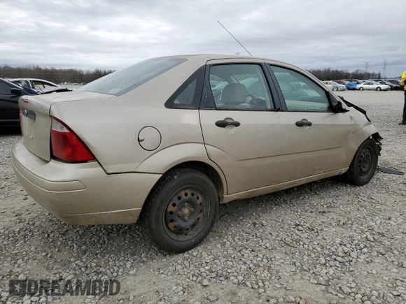 2007 Ford Focus S with VIN 1FAFP34N07W242359, listed as a Copart auction lot 61677025 with 164,445 mi miles and Salvage title. Bid and sale history available at DreamBid. Image 3.