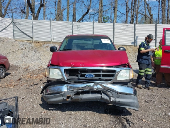 2003 Ford F-150 XLT with VIN 1FTRW07L13KD81923, listed as a IAAI auction lot 42112168 with 147,039 mi miles. Bid and sale history available at carsss.com. Image 13.