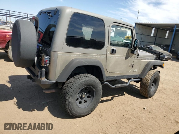2004 Jeep Wrangler Rubicon with VIN 1J4FA69S64P751349, listed as a Copart auction lot 69642624 with 160,589 mi miles and Salvage Title. Bid and sale history available at carsss.com. Image 3.
