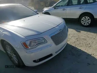 2012 Chrysler 300 C with VIN 2C3CCAKT7CH143419, listed as a Copart auction lot 46350825 with 130,839 mi miles and Salvage Title. Bid and sale history available at DreamBid. Image 11.