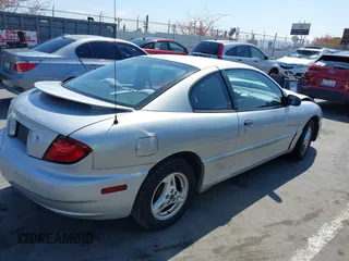 2004 Pontiac Sunfire z VIN 1G2JB12F247265977, wystawiony jako IAAI lot #42164549 z przebiegiem 137 209 mil mil oraz . Historia ofert i sprzedaży dostępna na DreamBid. Obrazek 4.