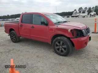 2012 Nissan Titan SV with VIN 1N6BA0EK4CN319941, listed as a Copart auction lot 43640705 with 210,885 mi miles and Salvage Title. Bid and sale history available at DreamBid. Image 4.