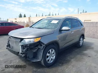 2013 Kia Sorento LX with VIN 5XYKT4A20DG315033, listed as a IAAI auction lot 41702643 with 123,011 mi miles. Bid and sale history available at carsss.com. Image 2.