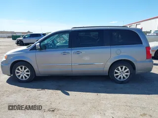 2016 Chrysler Town & Country Touring with VIN 2C4RC1BG7GR157863, listed as a IAAI auction lot 41849422 with 218,936 mi miles and . Bid and sale history available at DreamBid. Image 14.
