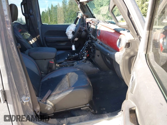 2023 Jeep Gladiator Rubicon with VIN 1C6JJTBG6PL538859, listed as a IAAI auction lot 42633055 with 22,899 mi miles and . Bid and sale history available at DreamBid. Image 5.