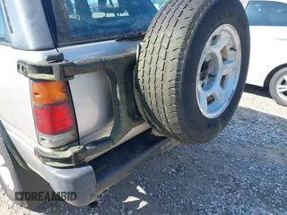 1995 Isuzu Rodeo z VIN 4S2CM58V4S4363500, wystawiony jako IAAI lot #41821801 z przebiegiem 94 480 mil mil oraz . Historia ofert i sprzedaży dostępna na DreamBid. Obrazek 6.