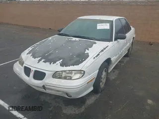 1998 Pontiac Grand Am SE2 with VIN 1G2NE52T7WM513702, listed as a IAAI auction lot 41503141 with 302,315 mi miles. Bid and sale history available at carsss.com. Image 2.